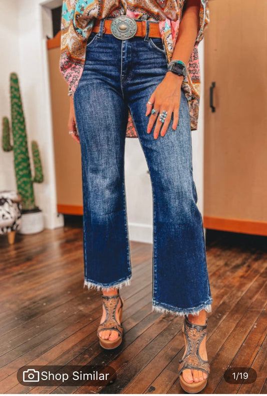 Blue jeans frayed bottoms